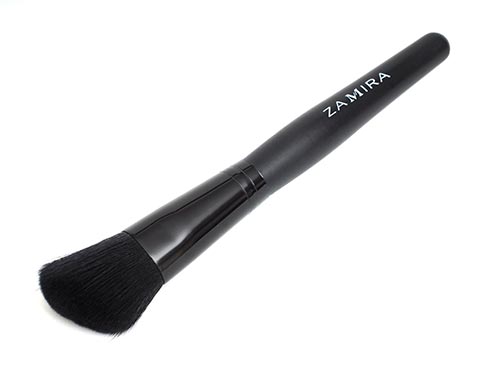 Angled Contour Brush. This angled and rounded brush gives a seamless finish to contour and blush products.